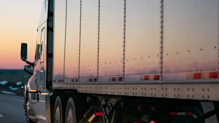 Trailer on the highway at dusk